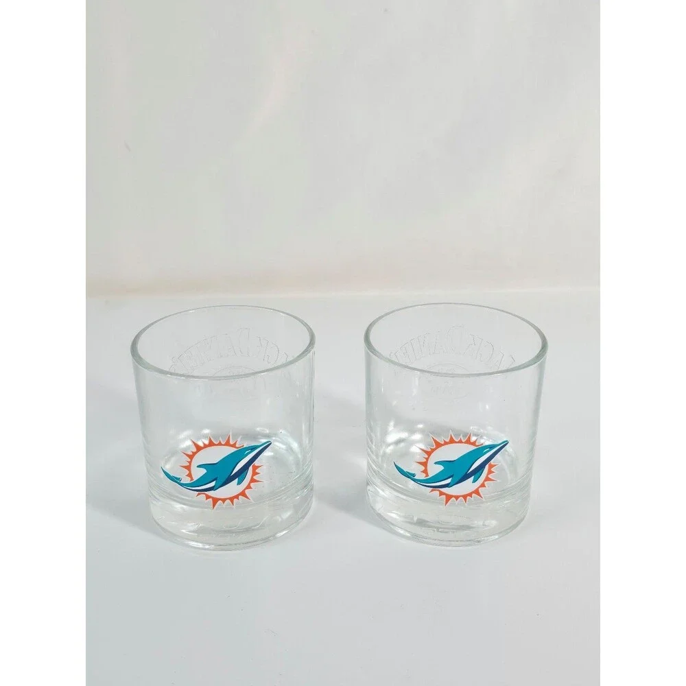 Jack Daniel's promotional NFL rocks glasses featuring the Miami Dolphins logo